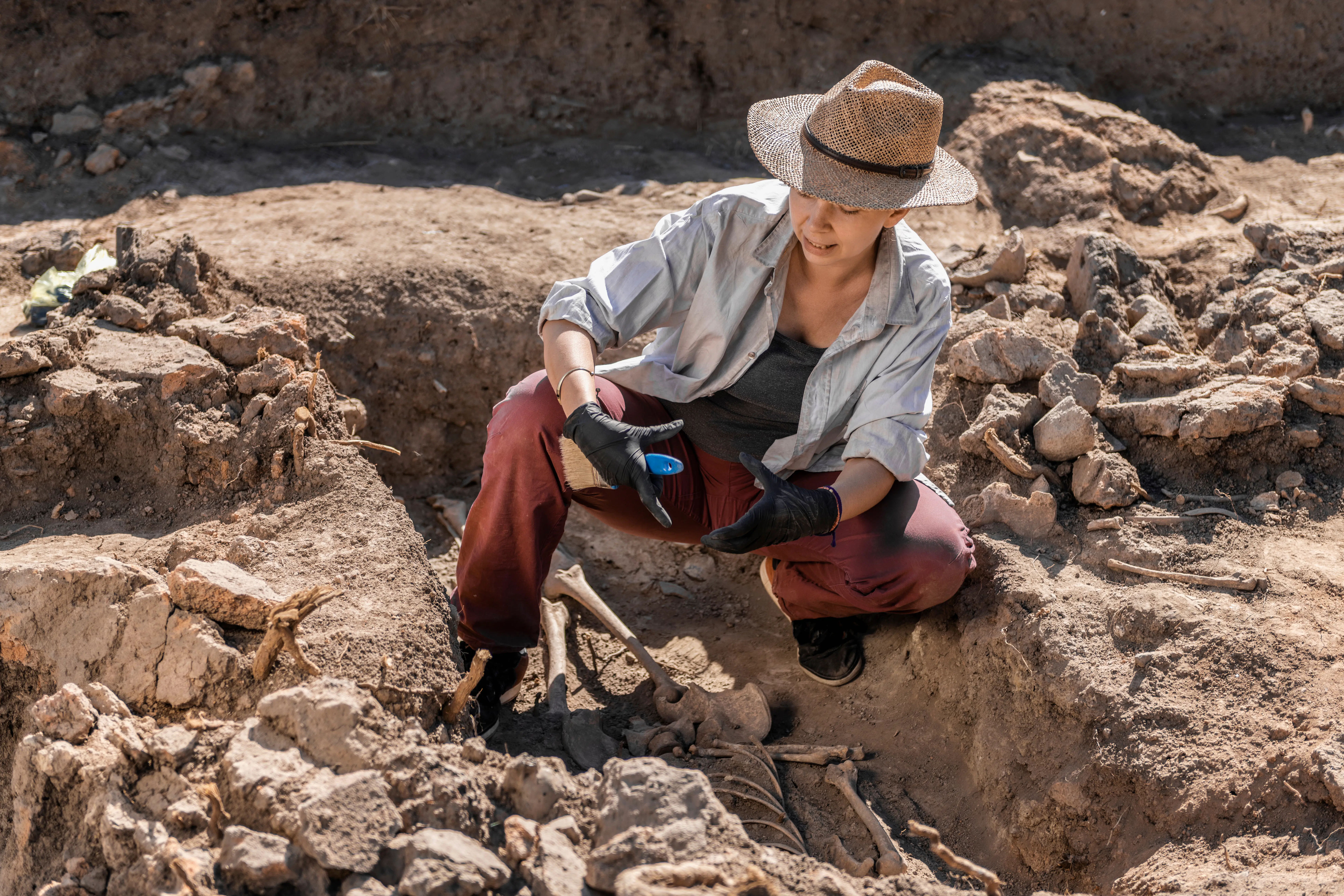 Archaeologist working on site