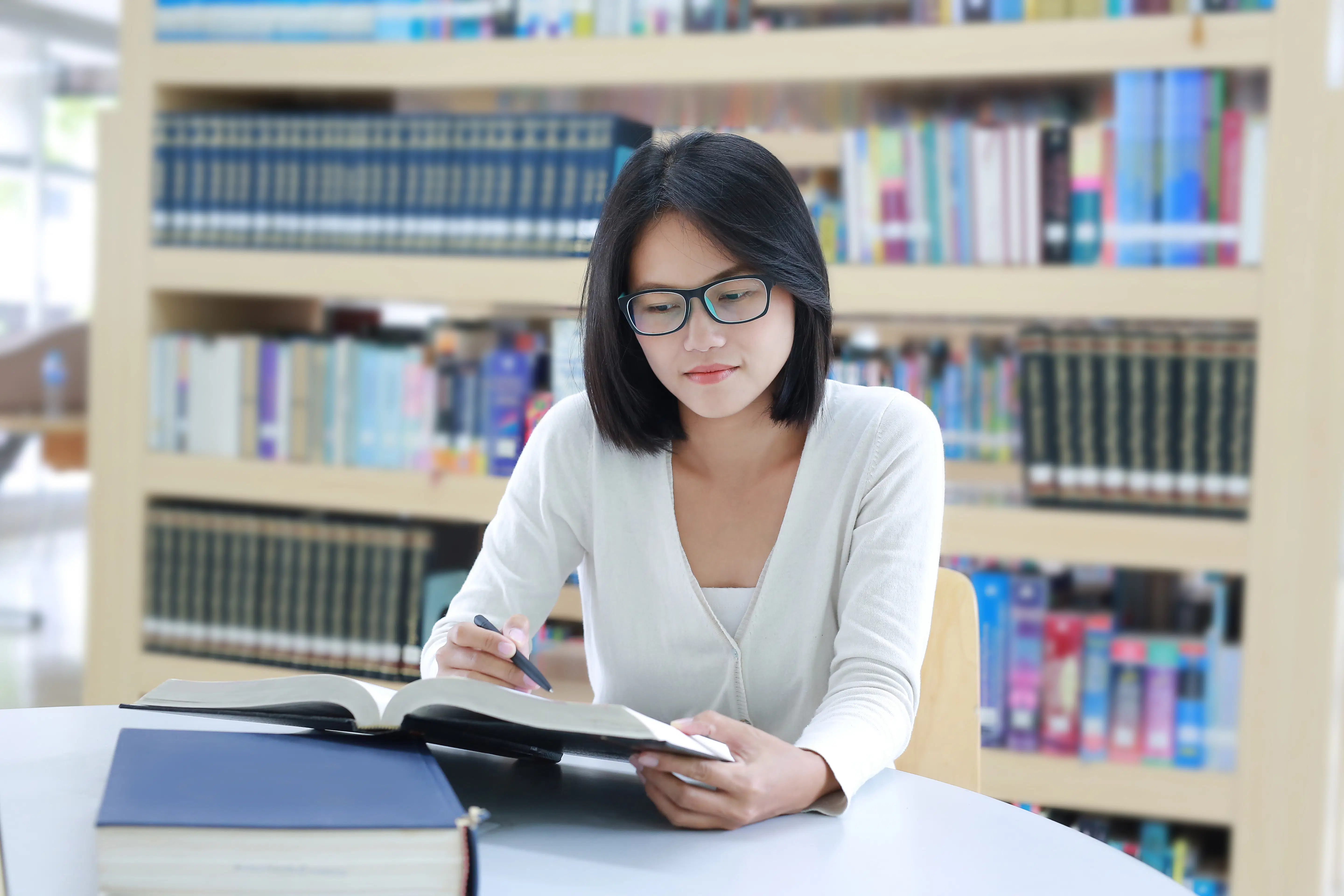 Law student reading in the library