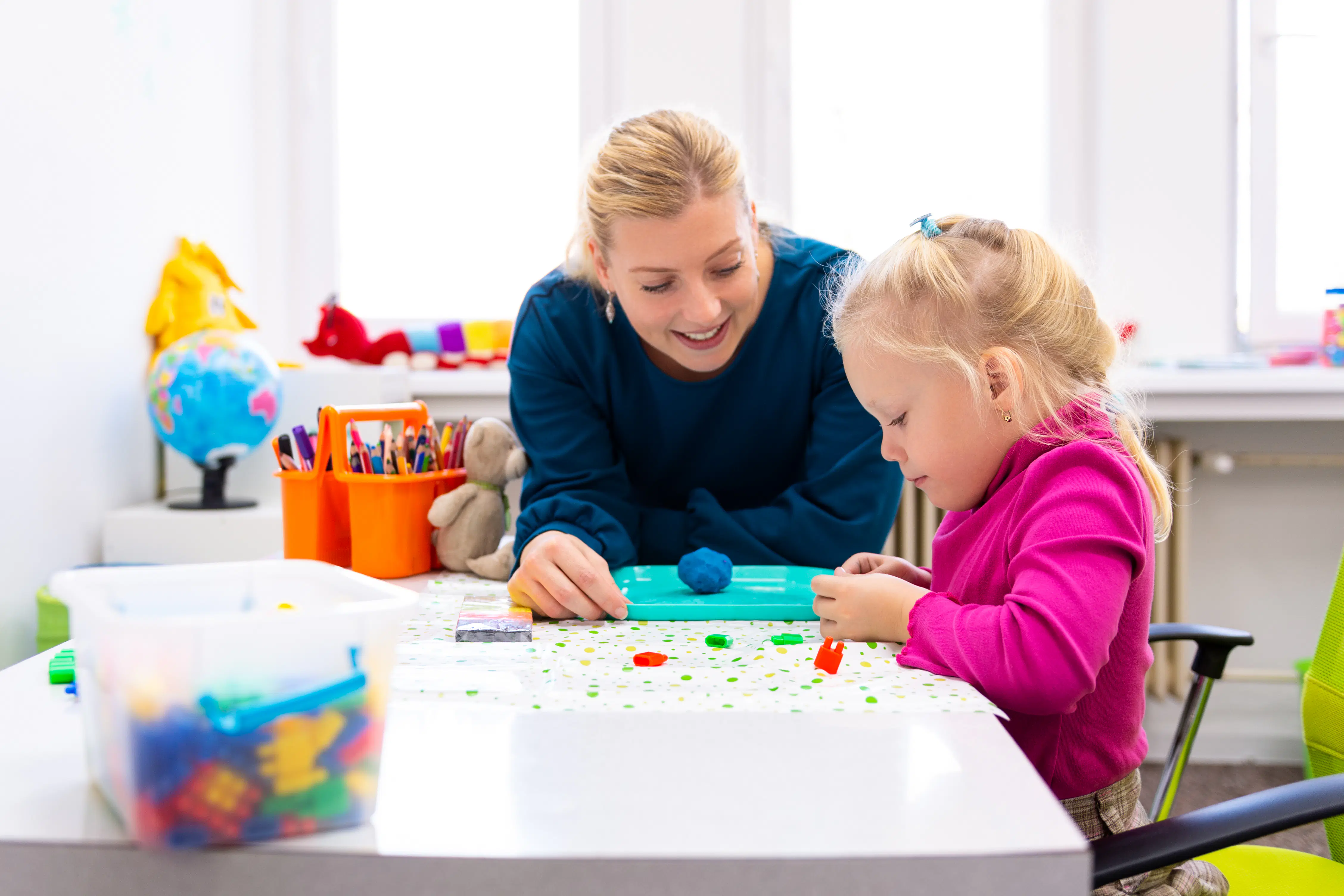 Female therapist working with child