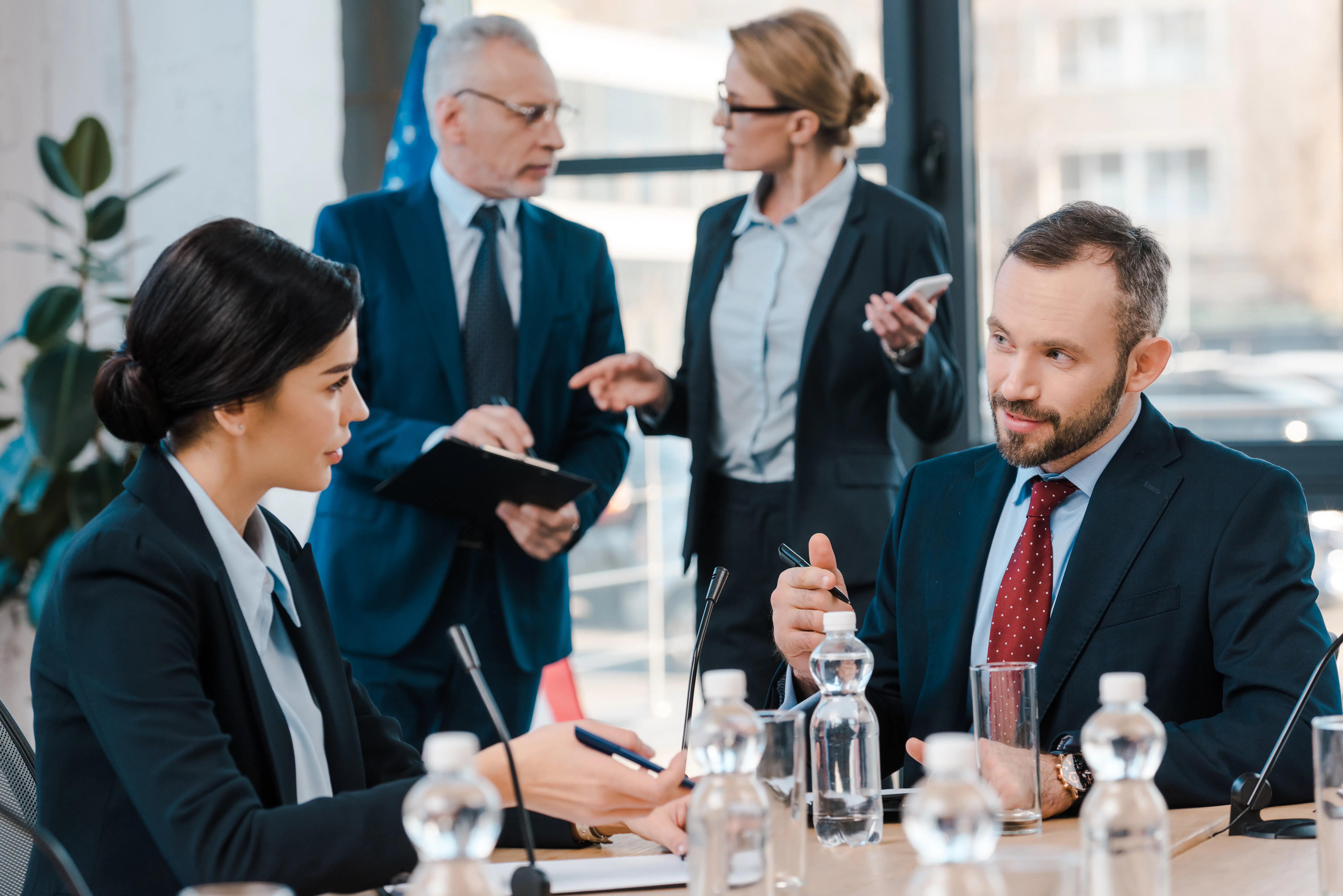 Diplomats discussing at a table