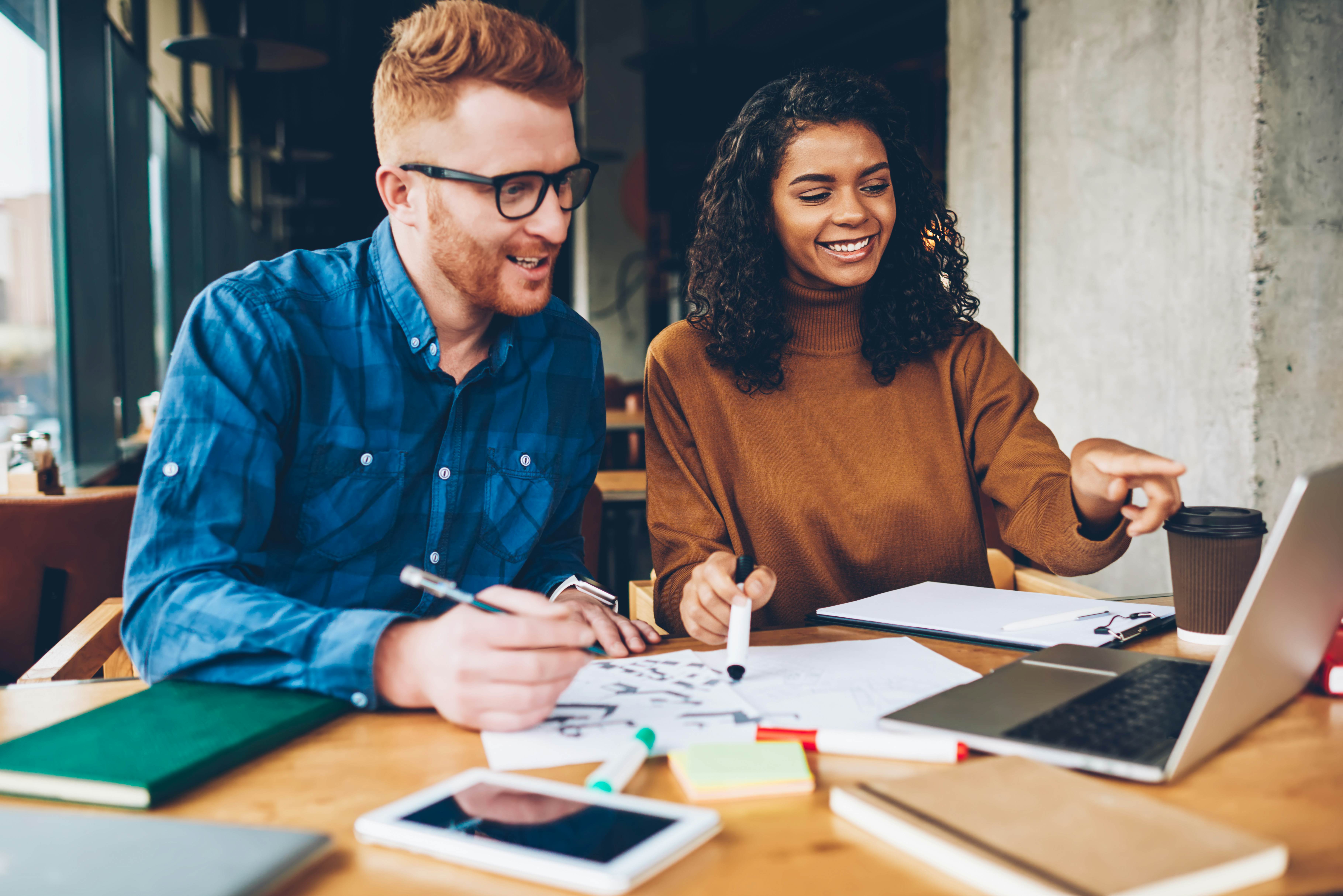 Tow college students taking their online courses together