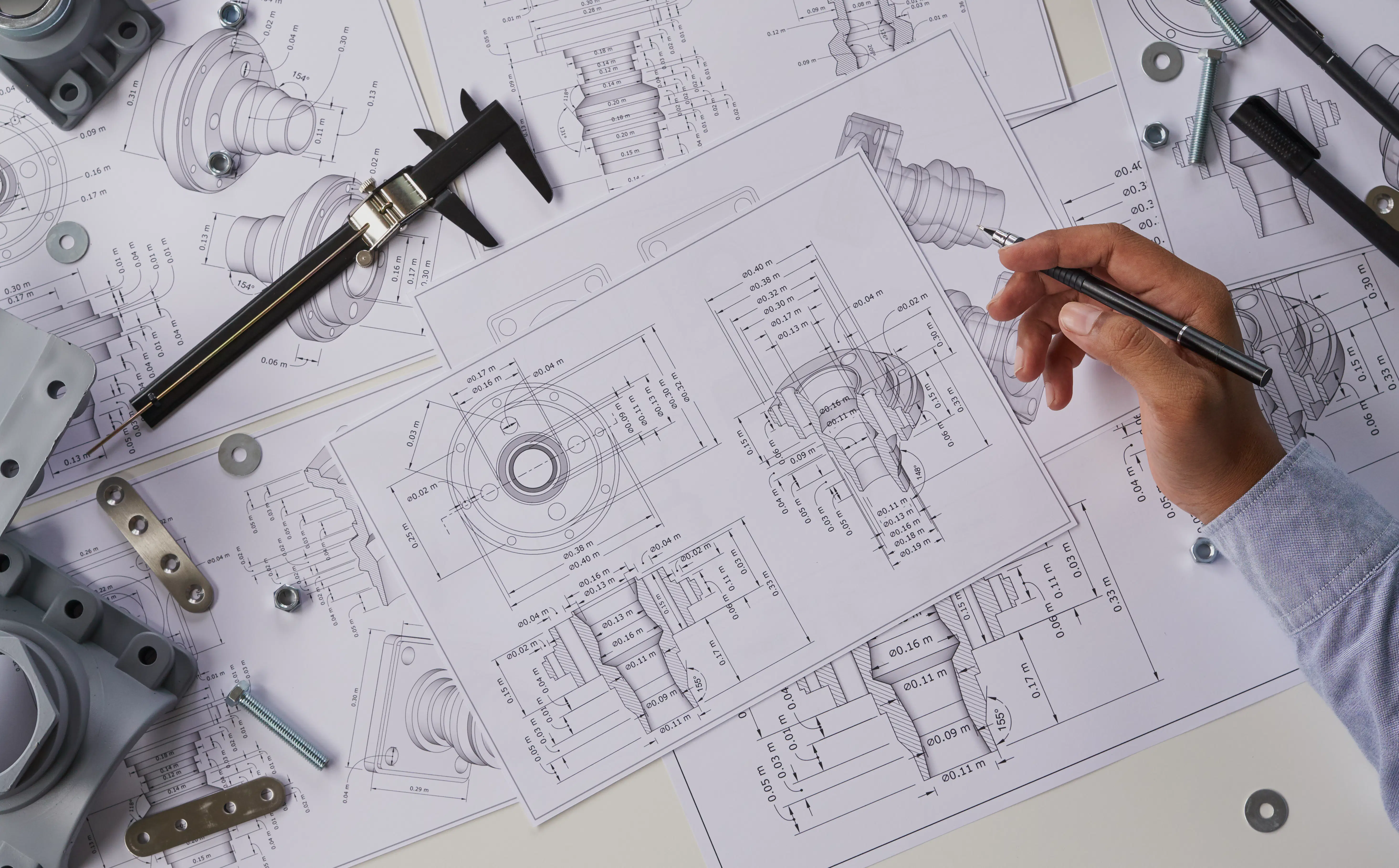 Engineering plans, drawings, and measuring tools