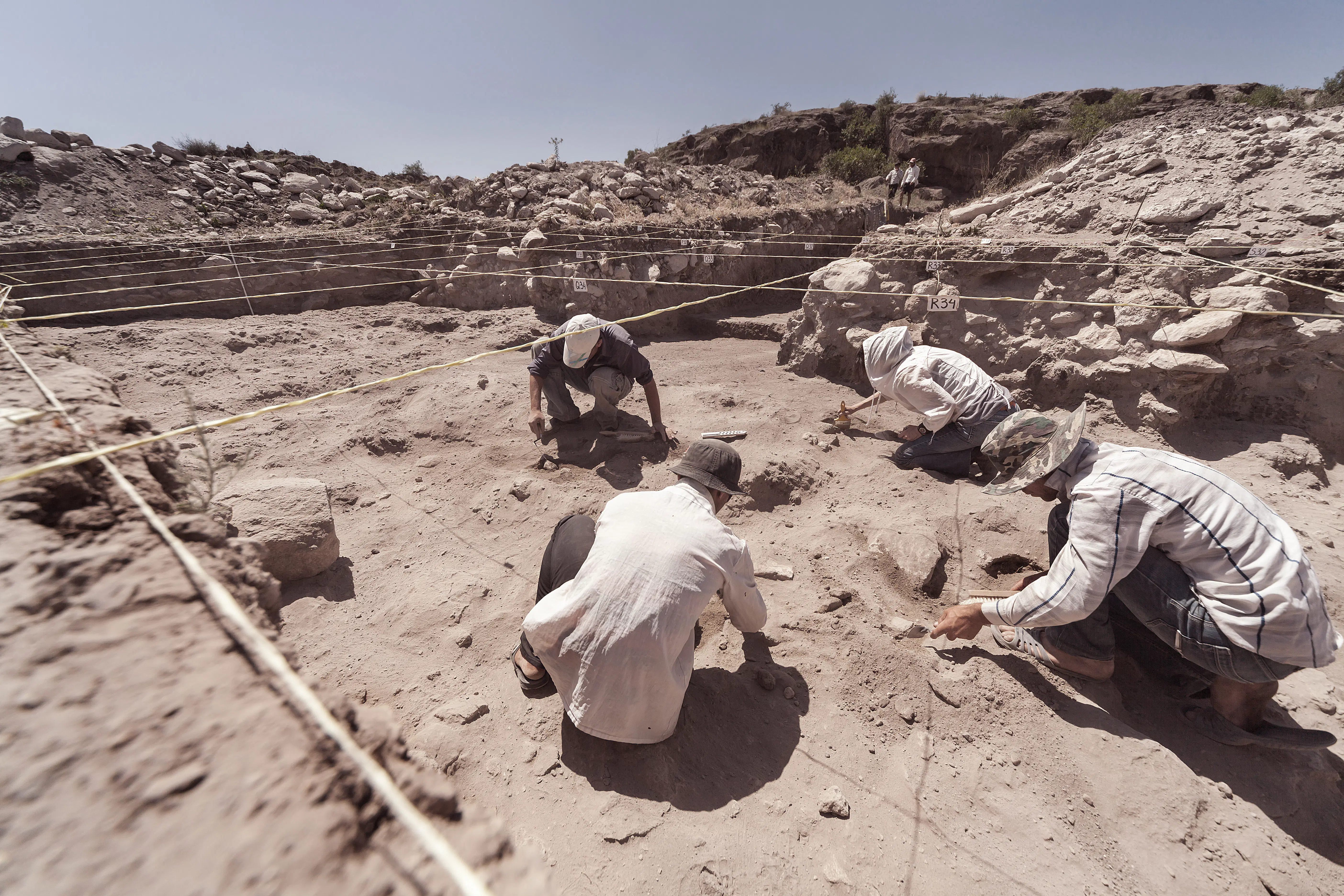 Archaeologists working on a site