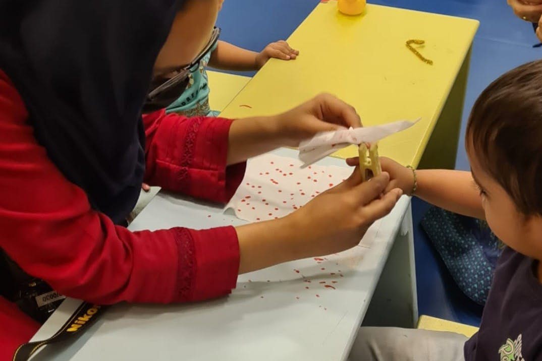 Studyportals Scholarship Winner Sidra Zahid Working on occupational skills in the preschool at the Karachi Down Syndrome Program