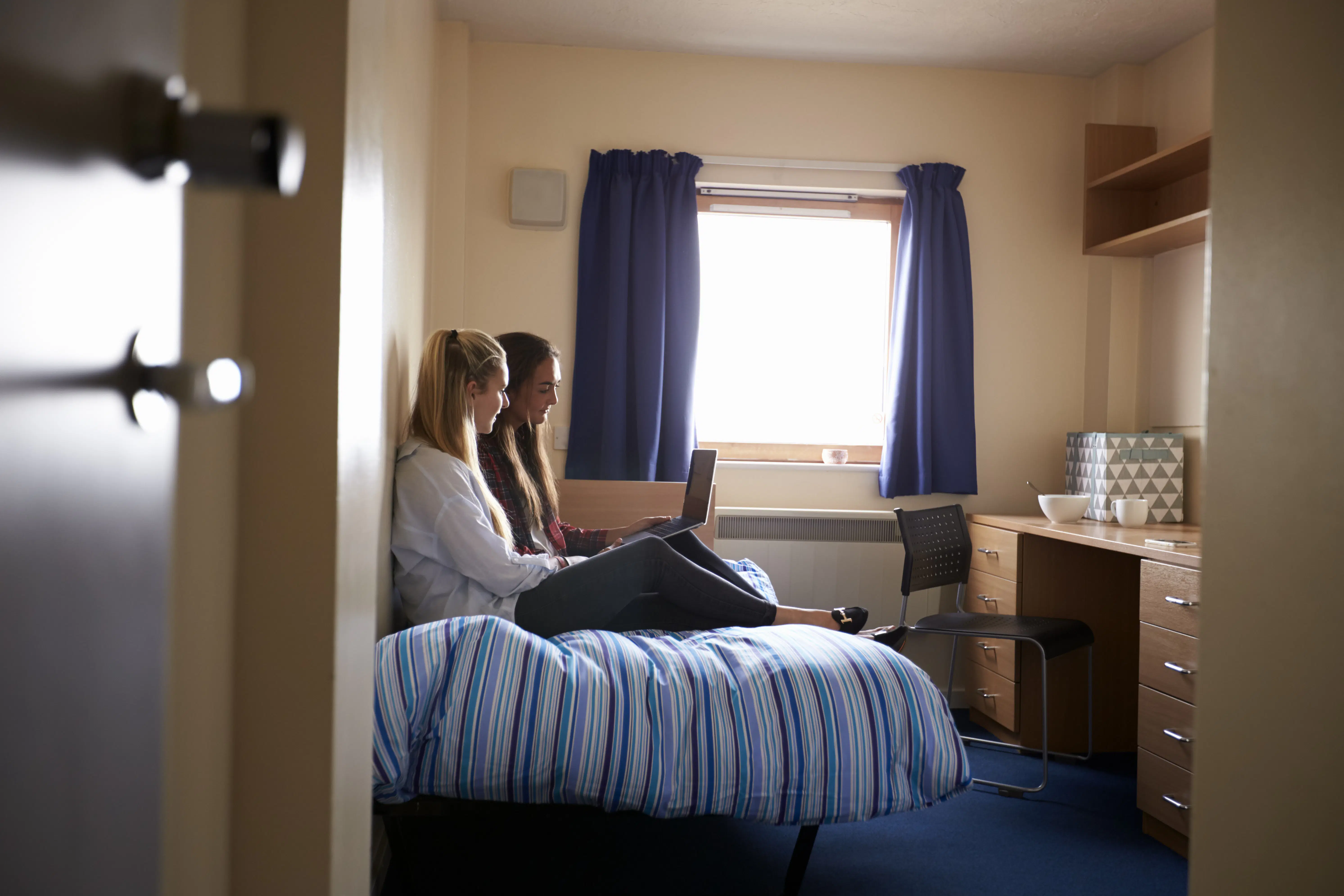 Student accommodation room with two students.