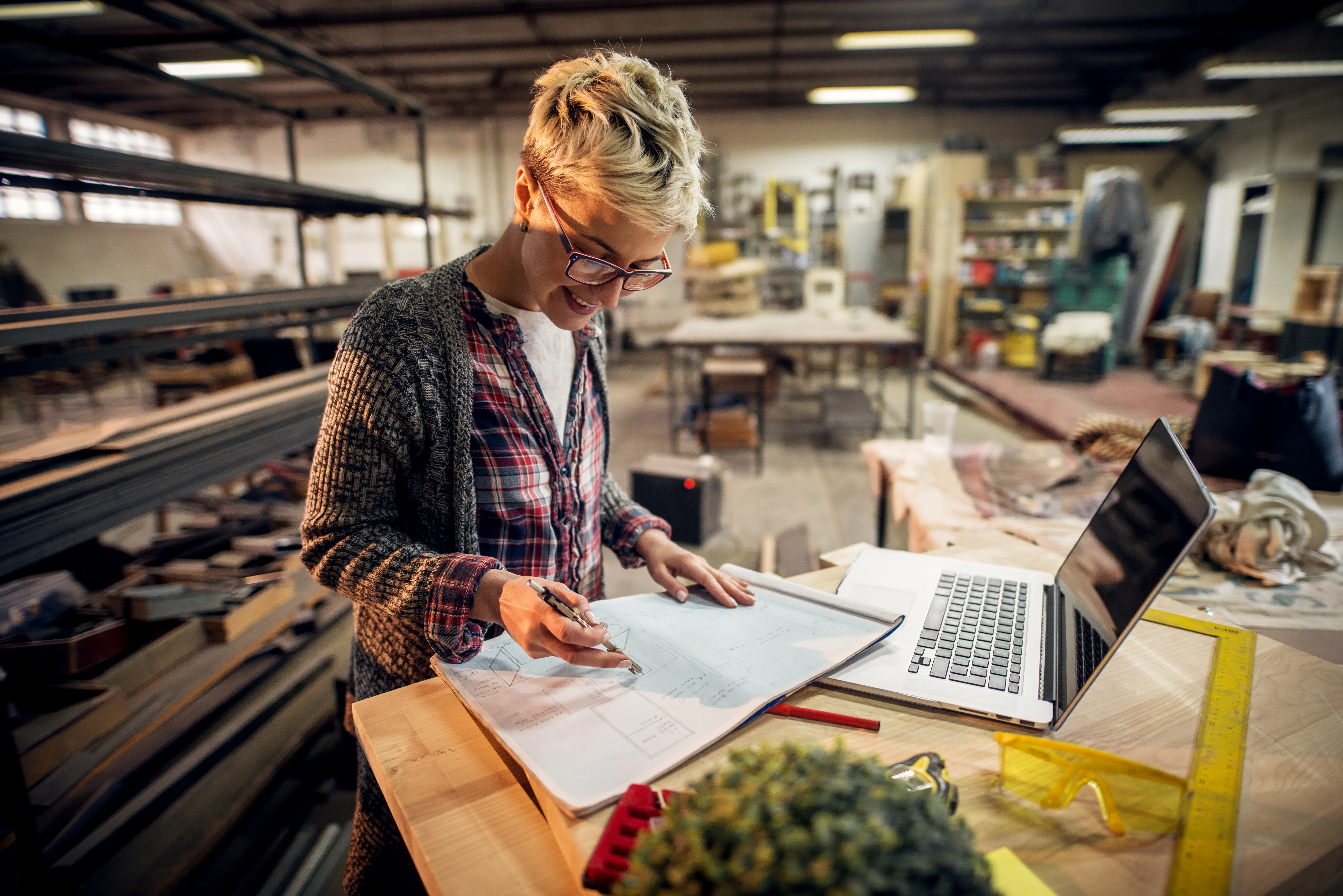 Female industrial designer working on a sketch