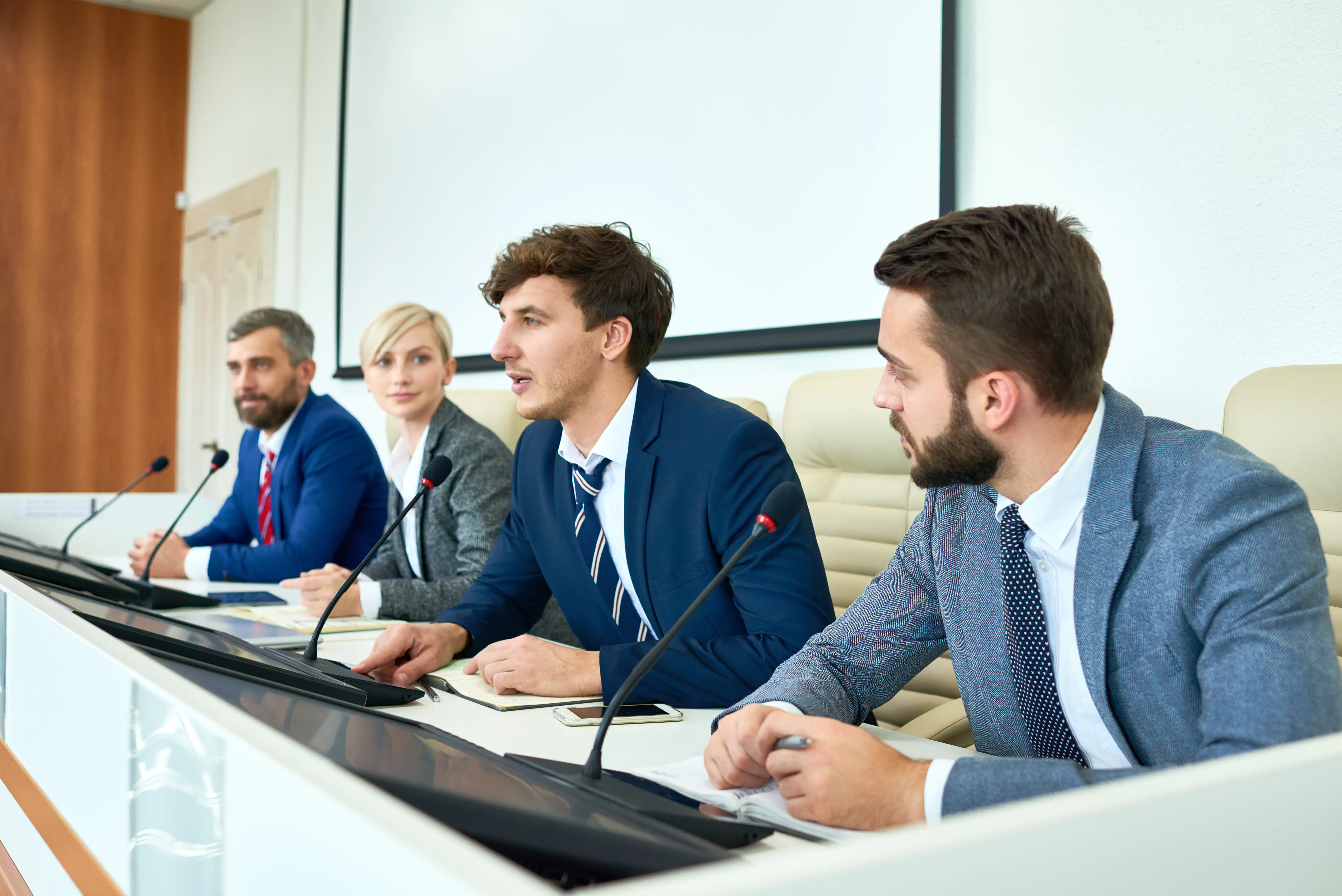 People talking during a press conference