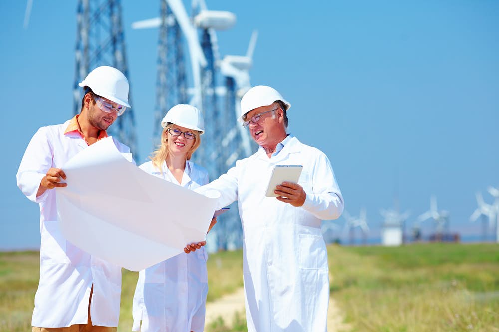 Environmental engineers discussing plans