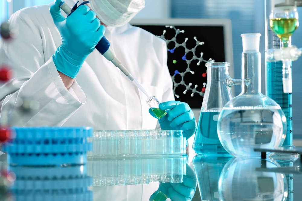 Researcher working with substances in a laboratory
