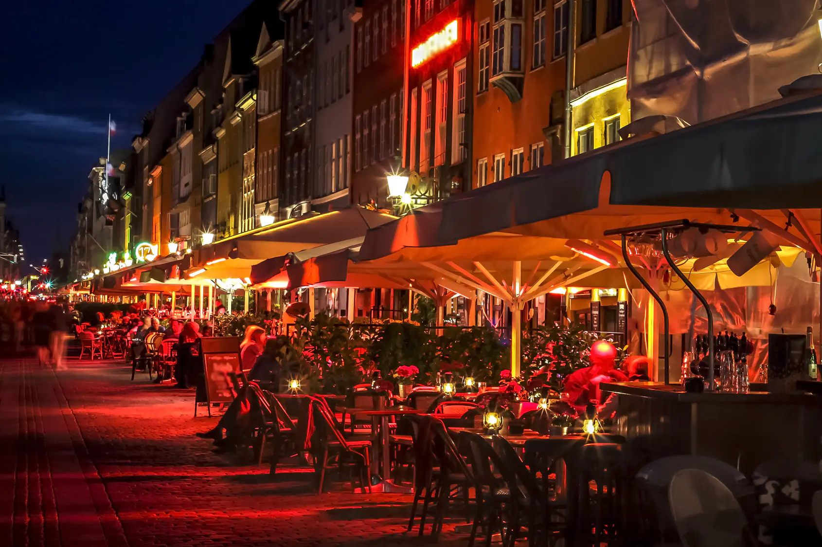 Street in Denmark with restaurants and terraces